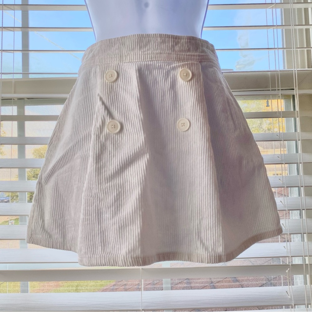 cream pleated skirt